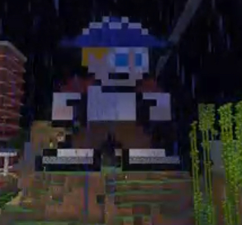 A screenshot from Foolish's stream. It's a pixel art statue of Tommy wearing his L'manberg hat on top of Tommy's house. It's raining.